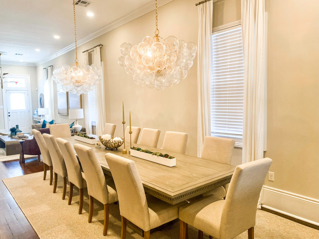 Dining table center pieces and chandeliers by Jade Interior Design